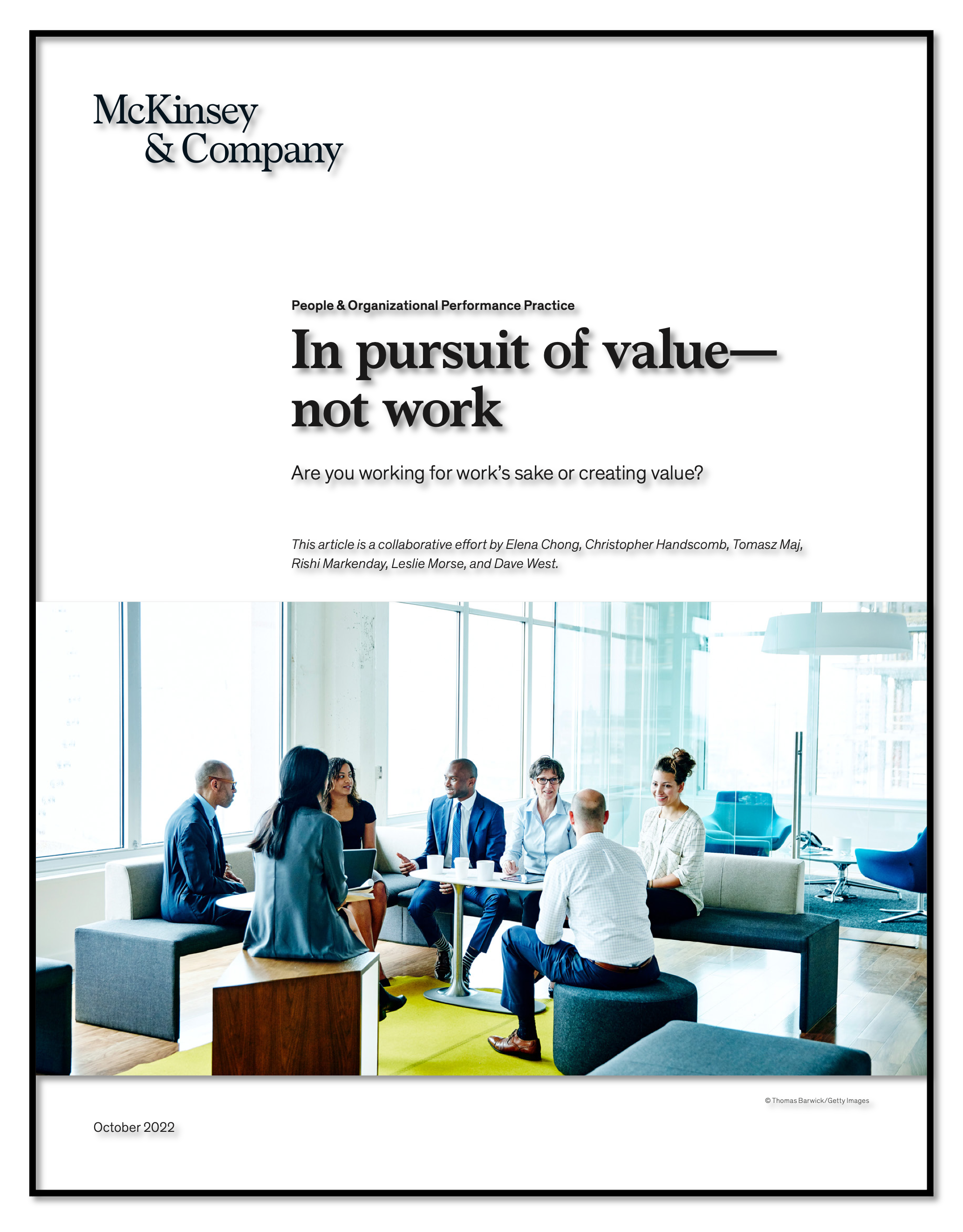 "In Pursuit of Value - desk with people working"