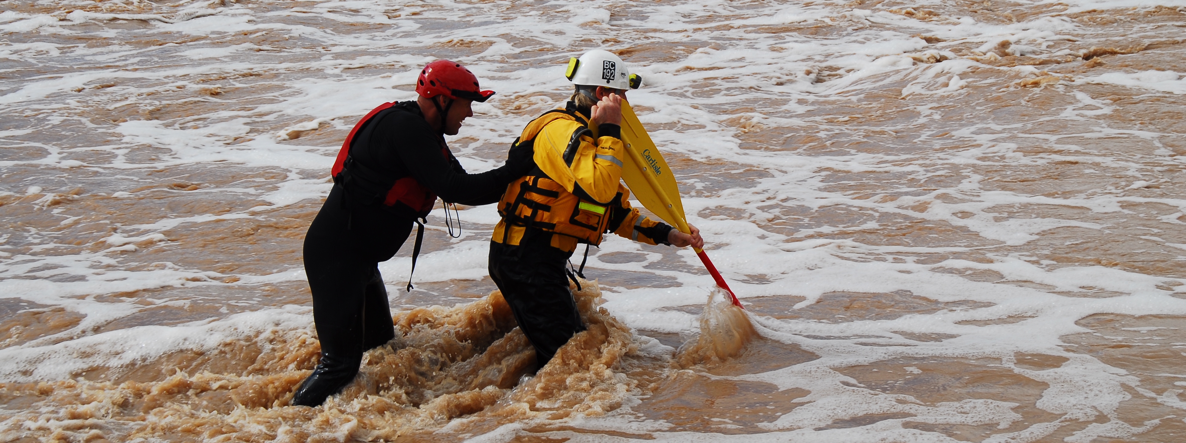 [Picture of people in a flood]