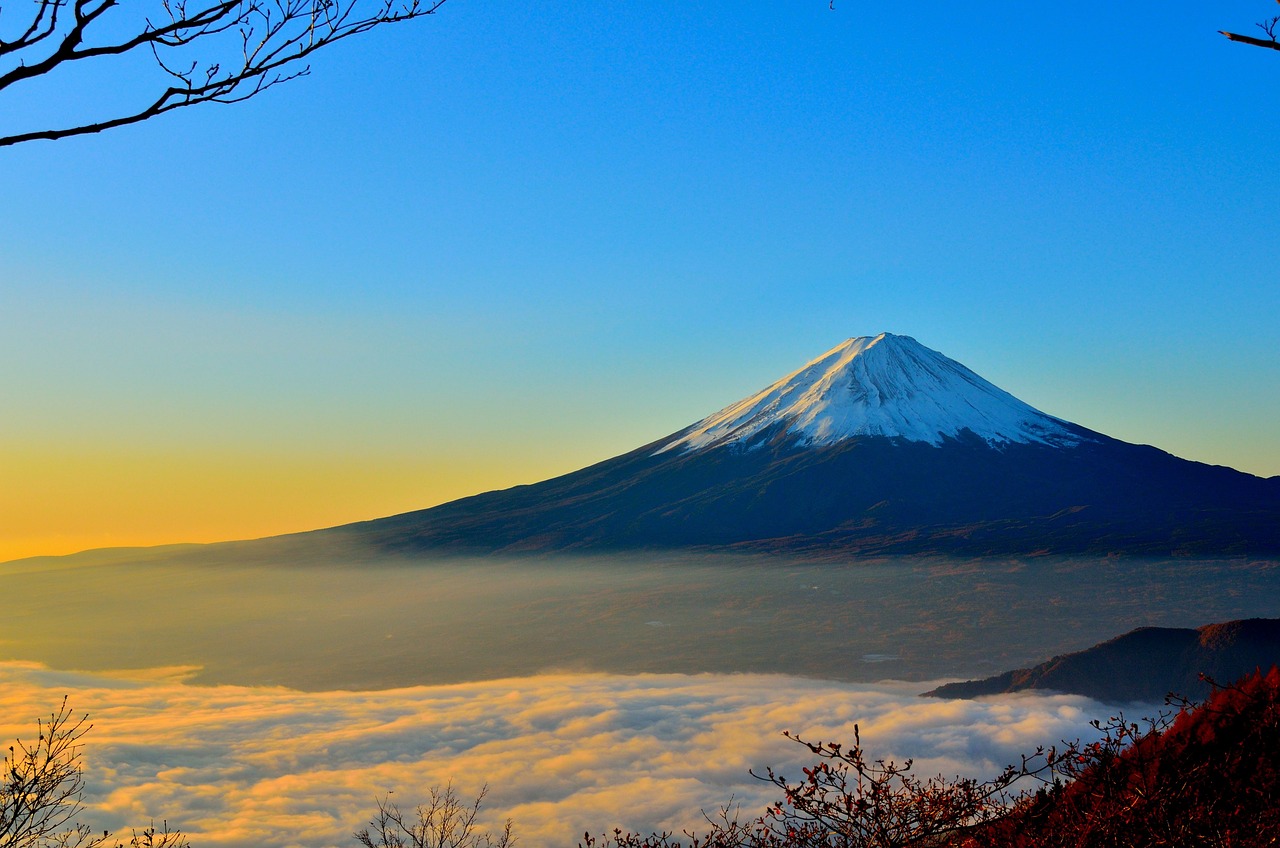 Serene mountain peak above the clouds