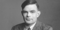 Portrait of Alan Mathison Turing. Photo credit: Walter Stoneman, Royal Society 1951
